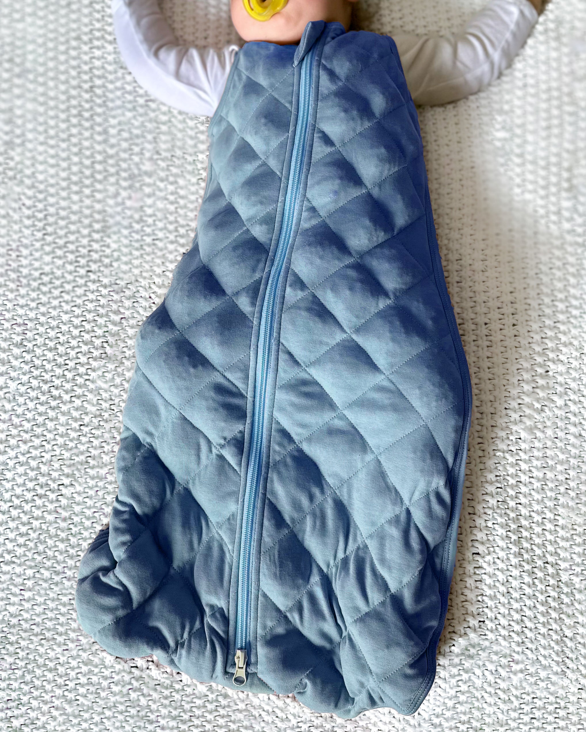 Baby sleeping in the KinCozy Dream Sack