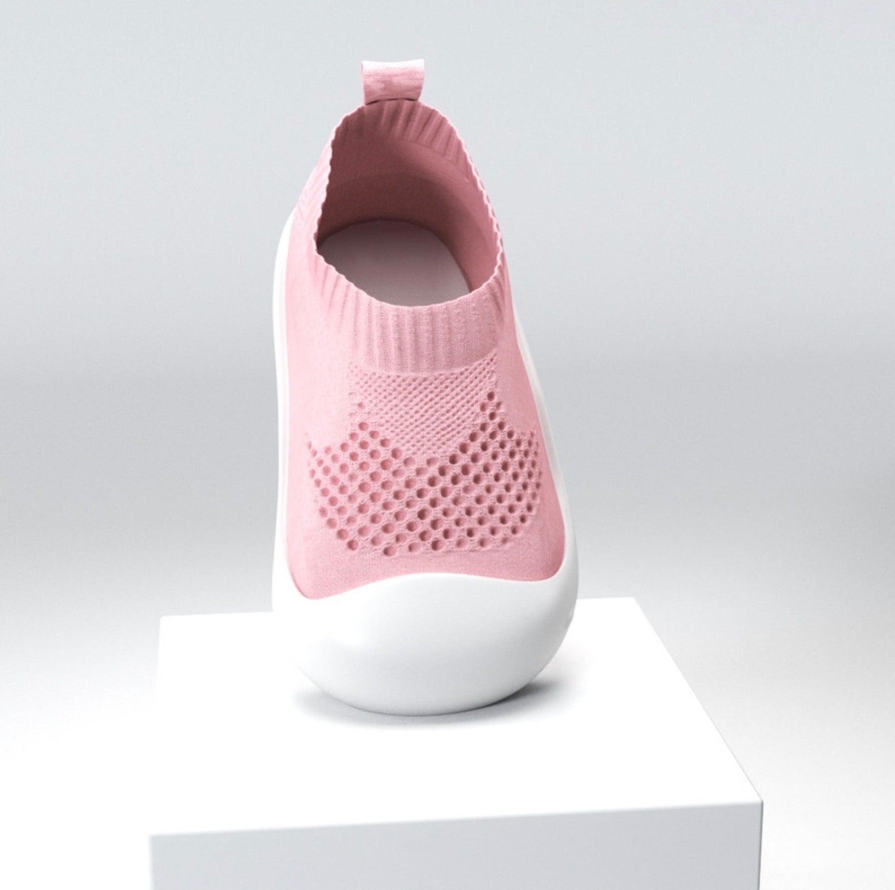 Baby wearing KinCozy First Steps mesh trainers