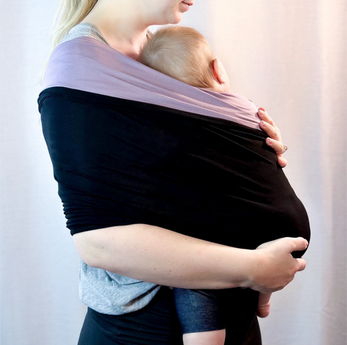 KinCozy Colour-Block Bonding Comforter — parent carrying baby hands-free product photo