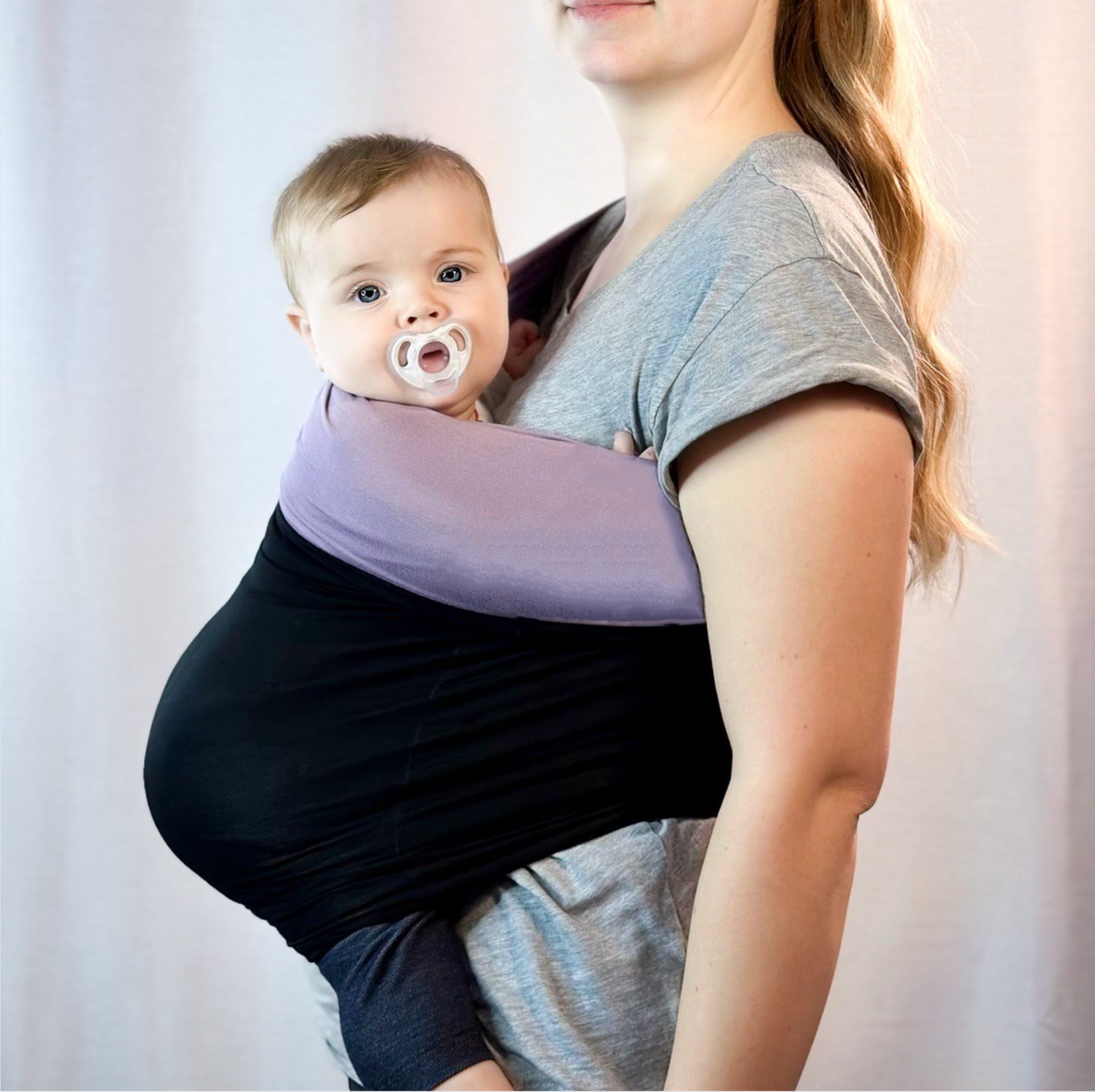 KinCozy Colour-Block Bonding Comforter — parent carrying baby hands-free product photo