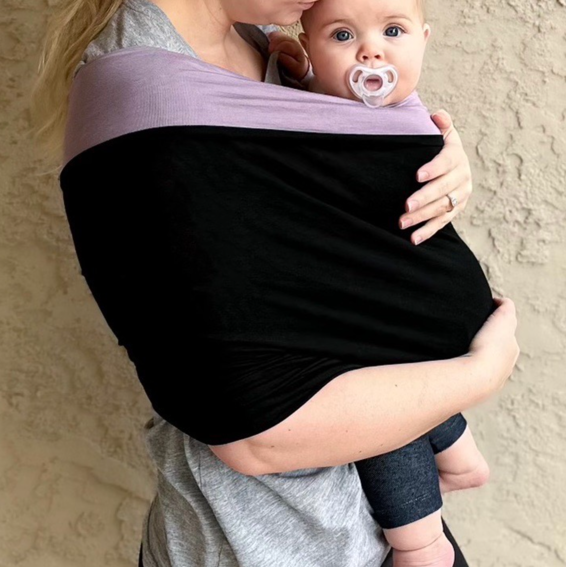 KinCozy Colour-Block Bonding Comforter — parent carrying baby hands-free product photo