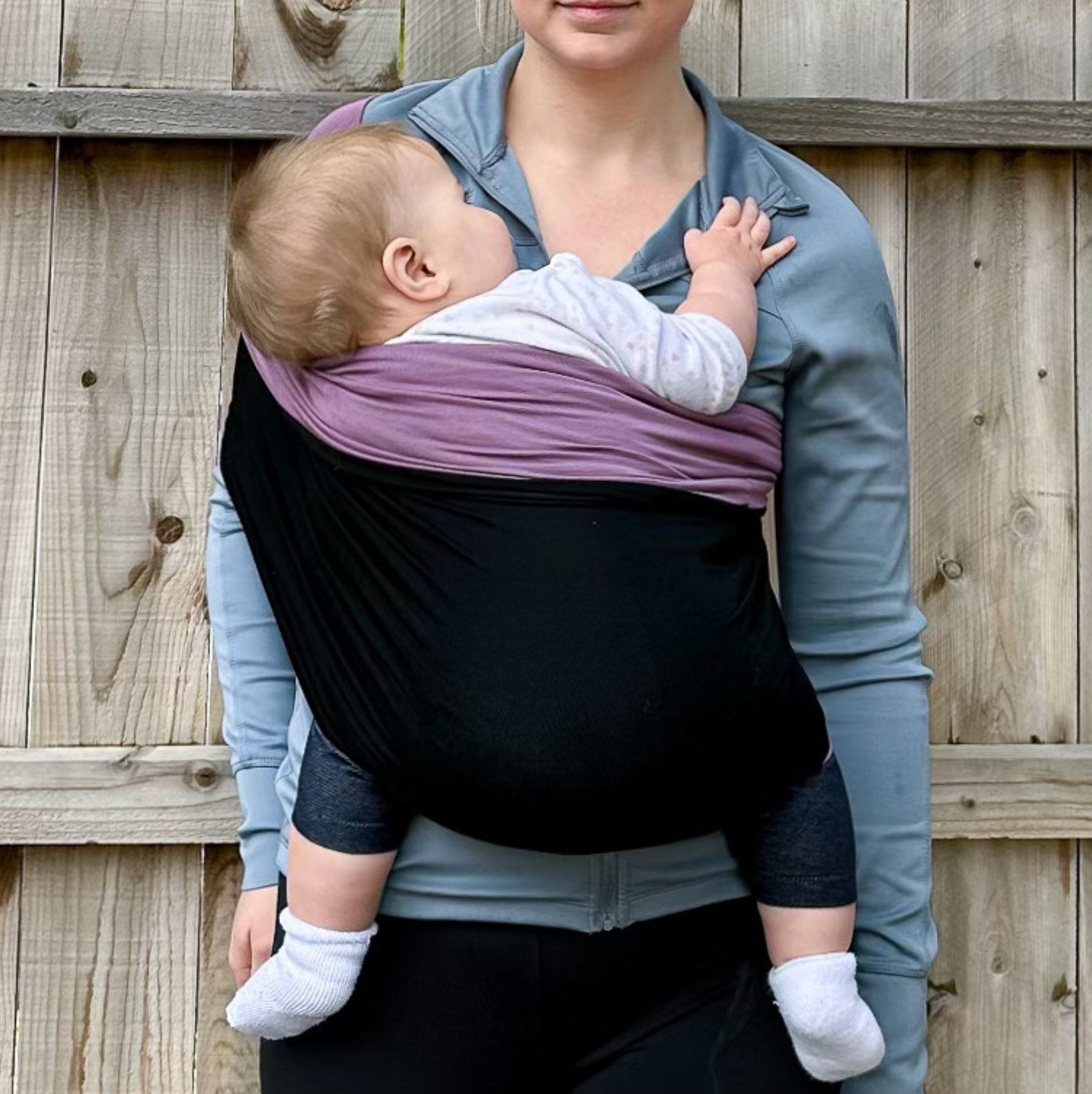 KinCozy Colour-Block Bonding Comforter — parent carrying baby hands-free product photo