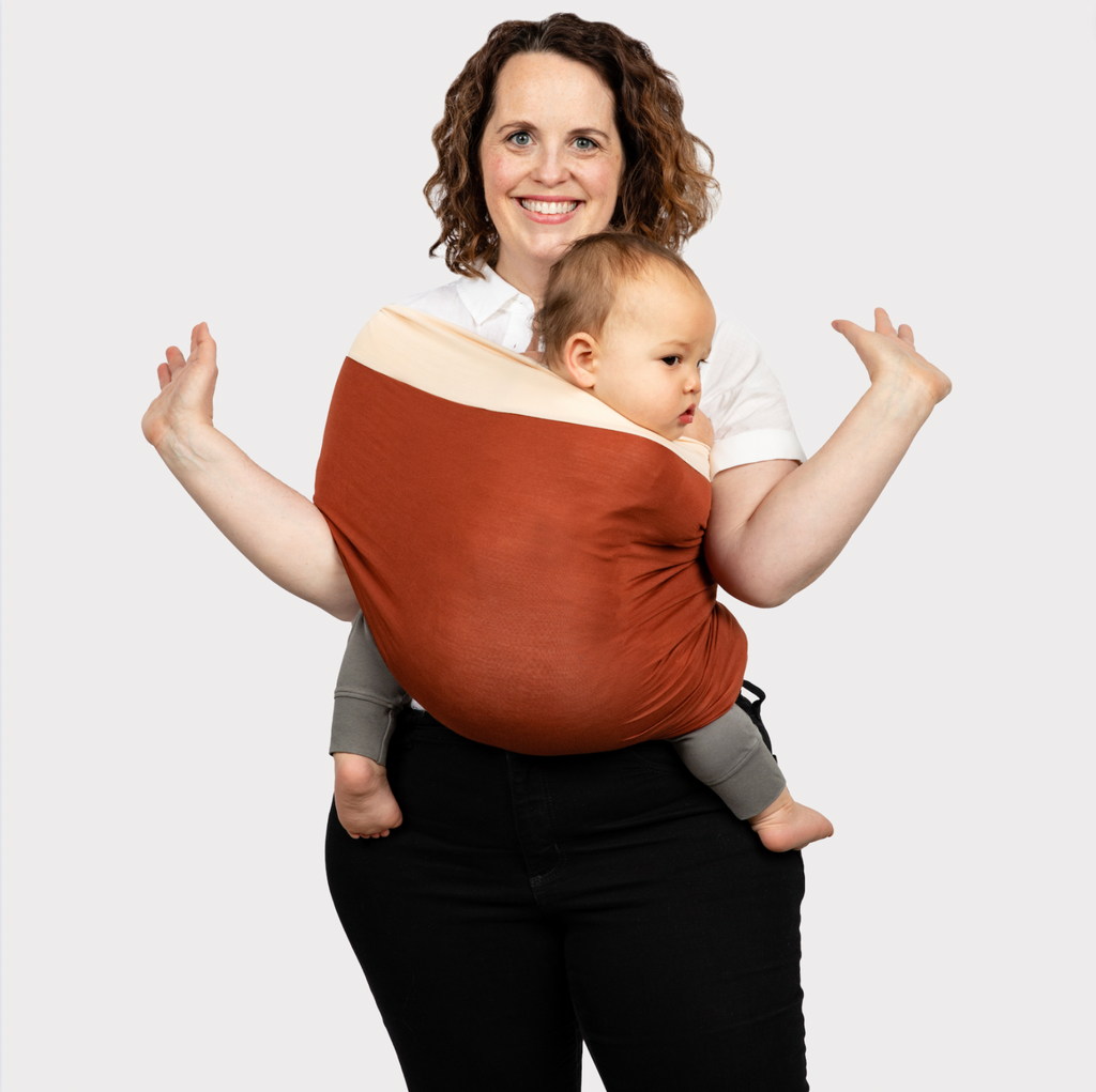 KinCozy Colour-Block Bonding Comforter — parent carrying baby hands-free product photo