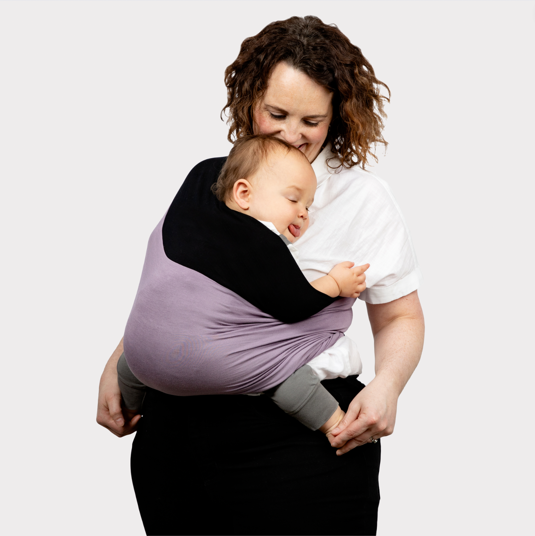 KinCozy Colour-Block Bonding Comforter — parent carrying baby hands-free product photo