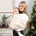 KinCozy Cozy Bonding Comforter in sherpa plush — parent carrying baby hands-free