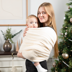 KinCozy Cozy Bonding Comforter in sherpa plush — parent carrying baby hands-free