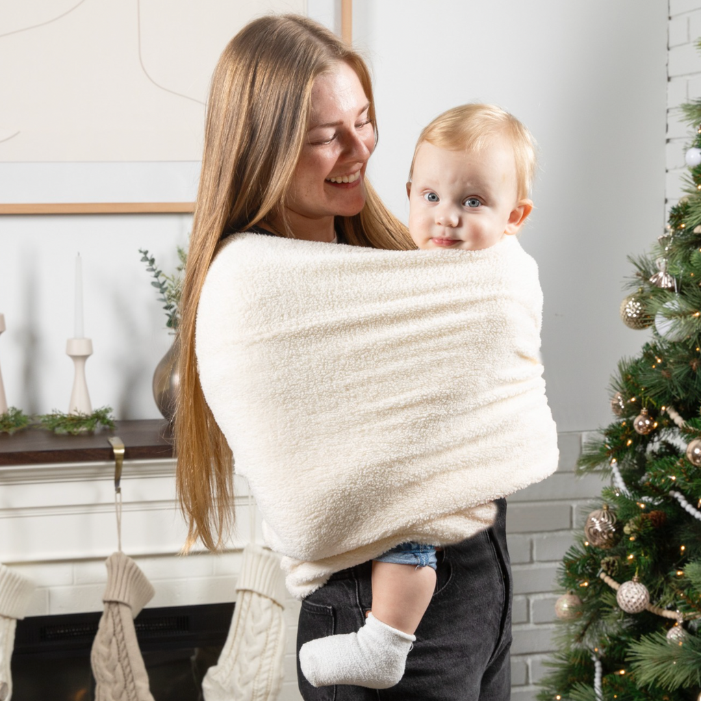 KinCozy Colour-Block Bonding Comforter — parent carrying baby hands-free product photo