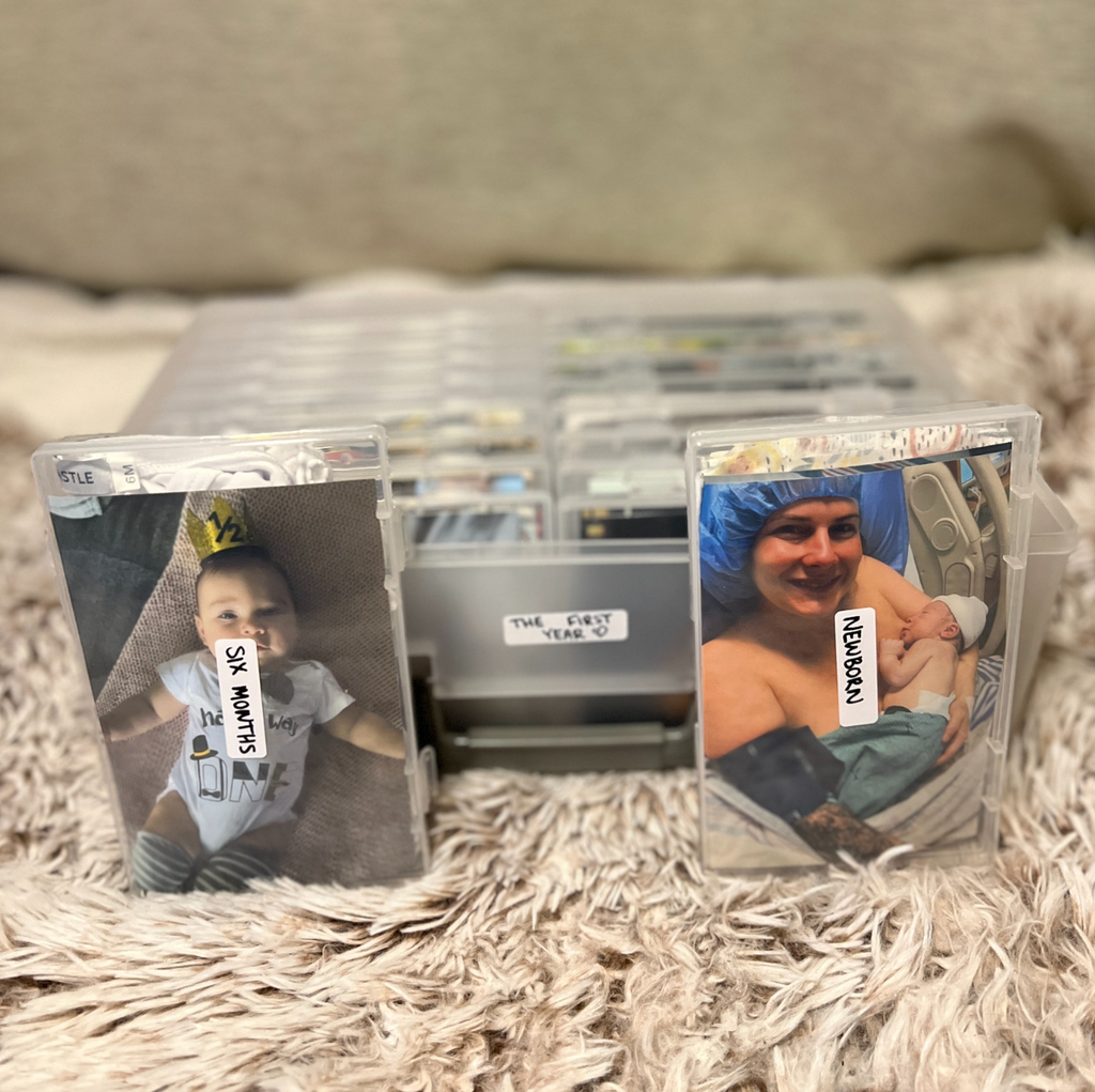 Memory box filled with baby photos and keepsakes
